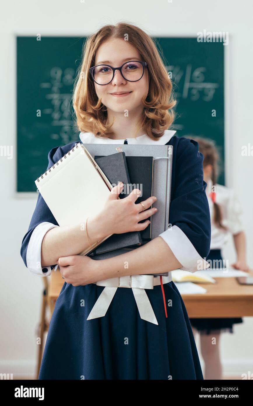 Smiling school girl hi-res stock photography and images - Alamy