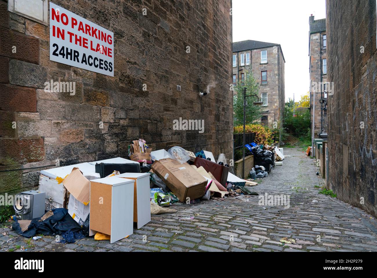 Glasgow, Scotland, UK. 23rd October 2021. Domestic waste is seen discarded in the streets of Govanhill in Glasgow with one week to the start of the UN Climate Change Conference COP26 in the city. City refuse collectors have said they will strike during the conference leading to fears that the city streets will be full of rubbish while in the world’s spotlight.  Iain Masterton/Alamy Live News. Stock Photo