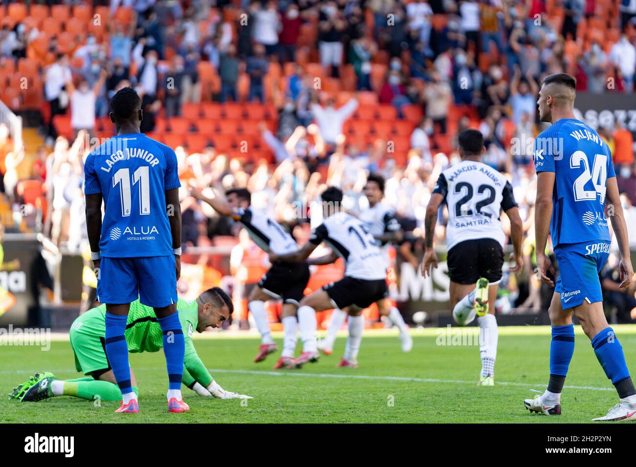 Jose Luis Gaya, Marcos Andre De Sousa of Valencia CF and Lago Junior, Manolo Reina of RCD Mallorca are seen in action during the Spanish La Liga, football match between Valencia CF