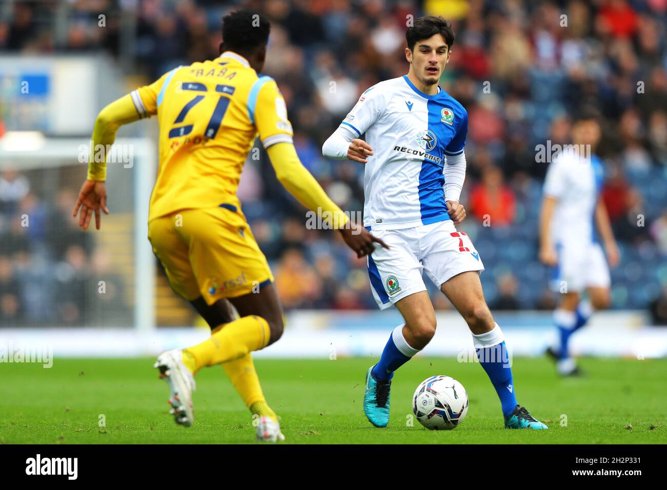 John Buckley #21 of Blackburn Rovers Under pressure fromAndy Rinomhota #35  of Cardiff City during the Sky Bet Championship match Cardiff City vs  Blackburn Rovers at Cardiff City Stadium, Cardiff, United Kingdom