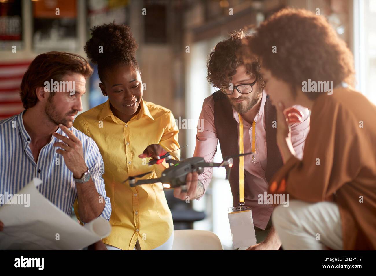 Group of young engineers projecting the drone together Stock Photo - Alamy