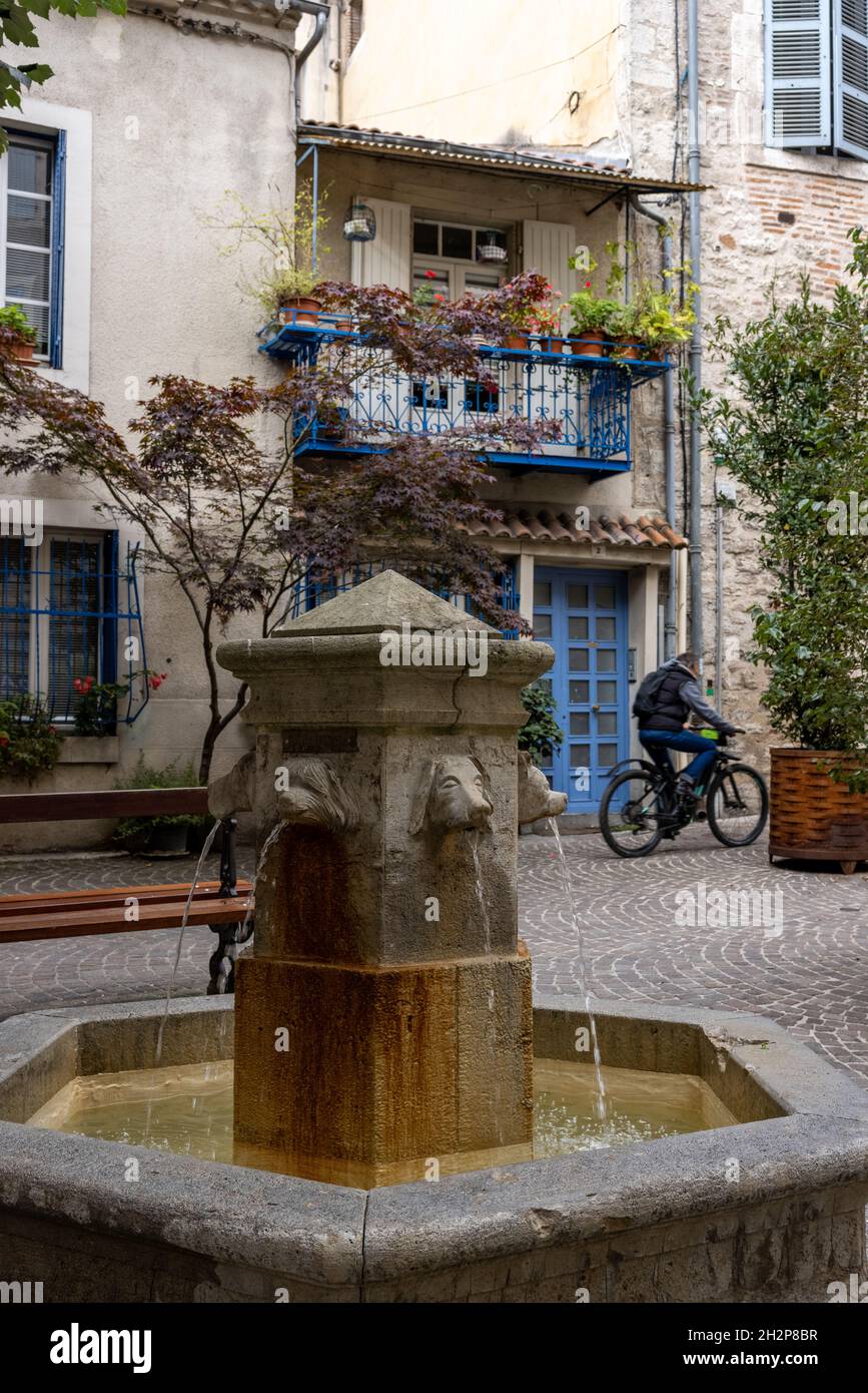 Dog Fountain in Place des Epices (Spices), Cahors, France Stock Photo
