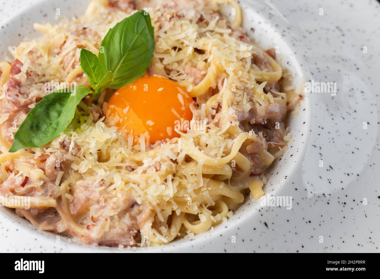 Pasta Carbonara Spaghetti With Bacon Parmesan Cream Sauce And Egg Yolk Macro Close Up Isolated On A White Round Plate Mediterranean Gourmet Food Stock Photo Alamy