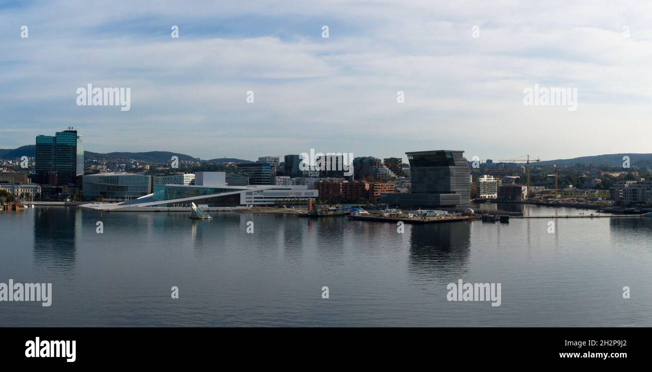 Oslo, Norway - 01 Sep 2021: Panoramic view on the modern architecture with famous Opera House and Munch museum Stock Photo