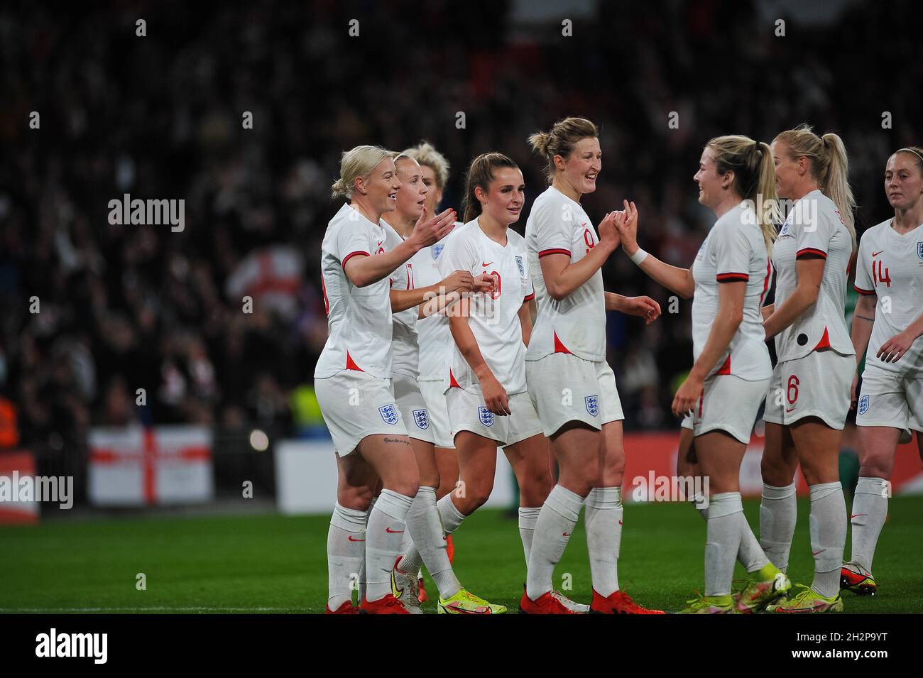 englland celebrate 2nd goal   During the Women's World Cup Qualifier game between England & Northern Ireland at Wembley  Stadium in London, England  Karl W Newton /Sports Press Phot Stock Photo