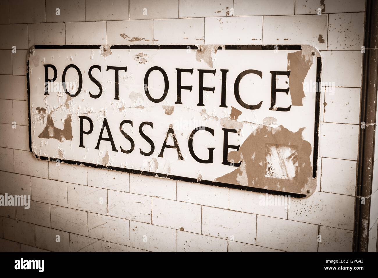 Post Office Passage Hastings in a golden sepia tone Stock Photo