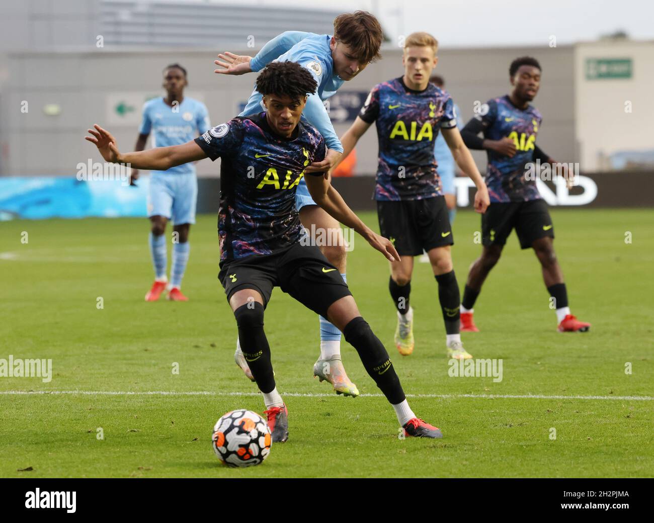 Manchester, England, 23rd October 2021.  Luca Barrington of Manchester City challenges Brooklyn Lyons-Foster of Tottenham during the Professional Development League match at the Academy Stadium, Manchester. Picture credit should read: Darren Staples / Sportimage Stock Photo