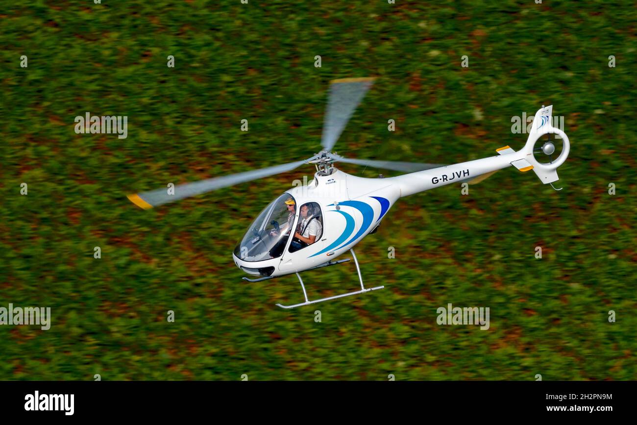 Guimbal Cabri G2, G-RJVH Helicopter transitting low level in LFA7 Stock Photo