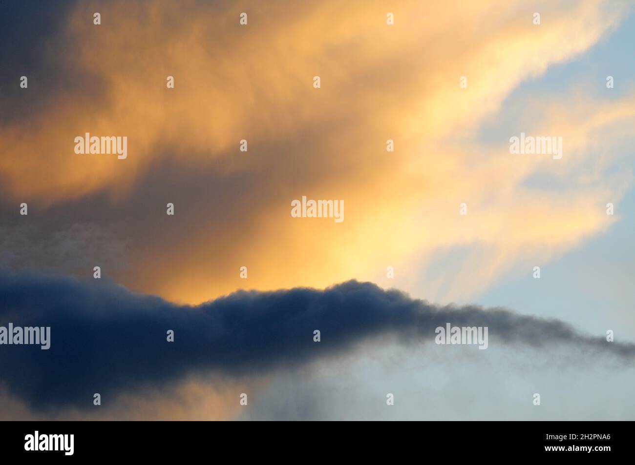 Stratus and altostratus clouds at sunset Stock Photo Alamy