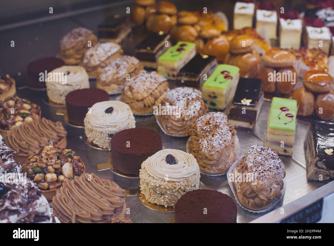 French sweet desserts in patisserie bakery, pastry cakes in the shop for sale Stock Photo Alamy
