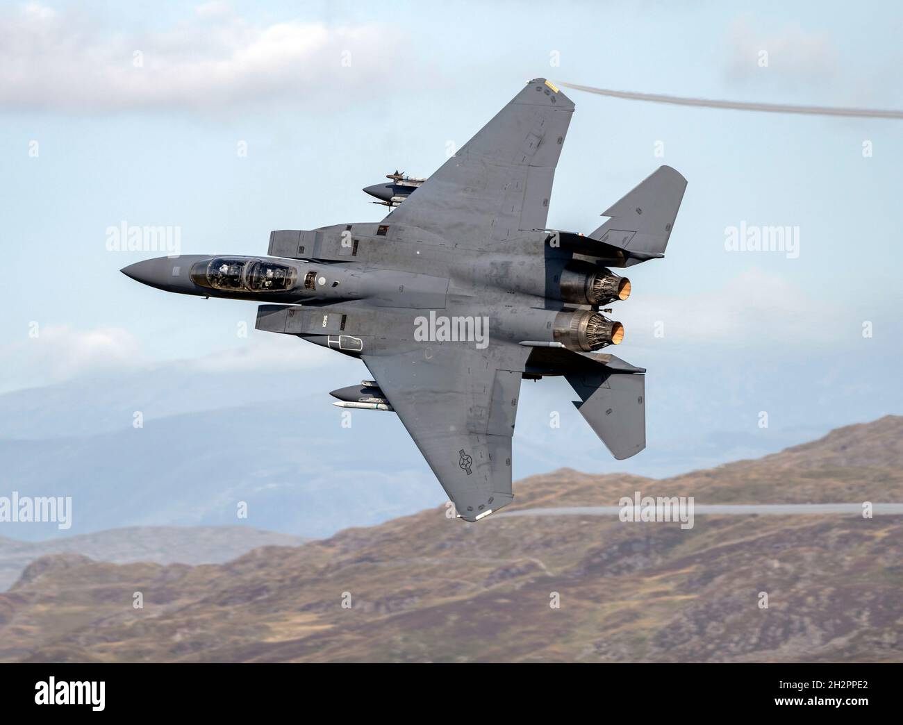USAF F-15E Strike Eagle from RAF Lakenheathlow level flying sortie in Wales low flying area 7 (LFA7, Mach Loop) Stock Photo