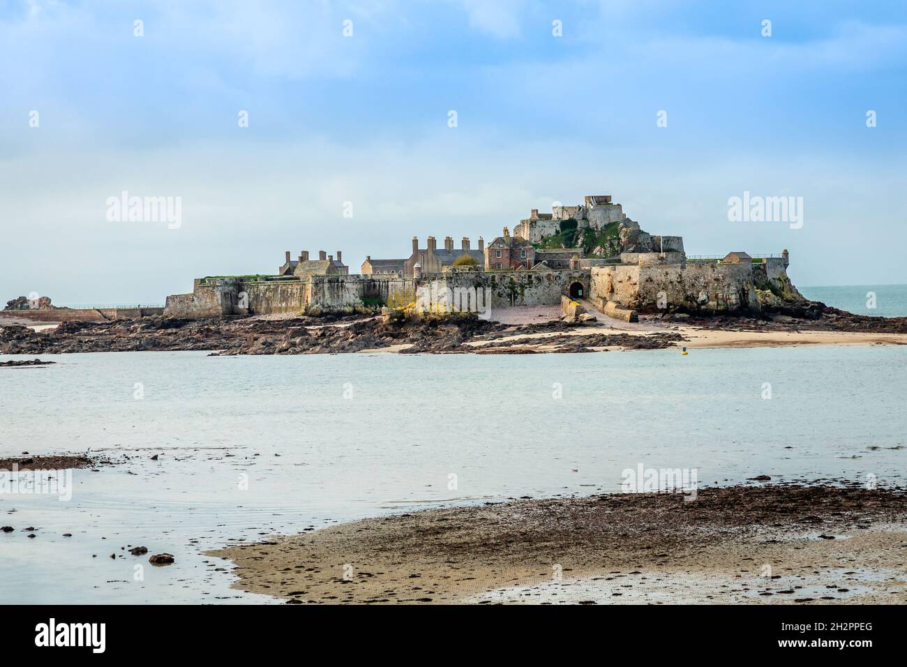 Elizabeth Castle in a low tide waters, Saint Helier, bailiwick of Jersey, Channel Islands Stock Photo