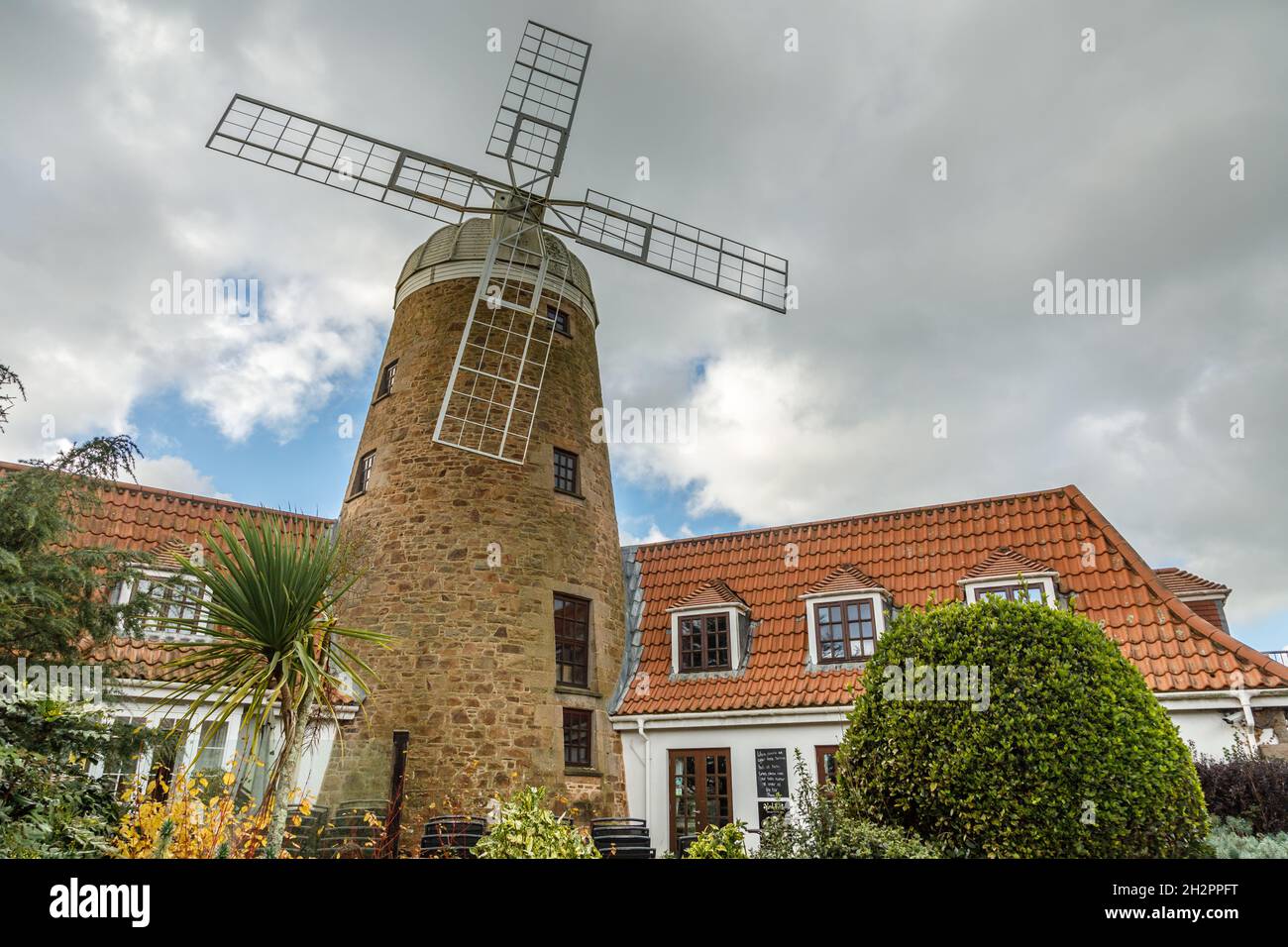 Stone windmill in Saint Peter, bailiwick of Jersey, Channel Islands, UK Stock Photo