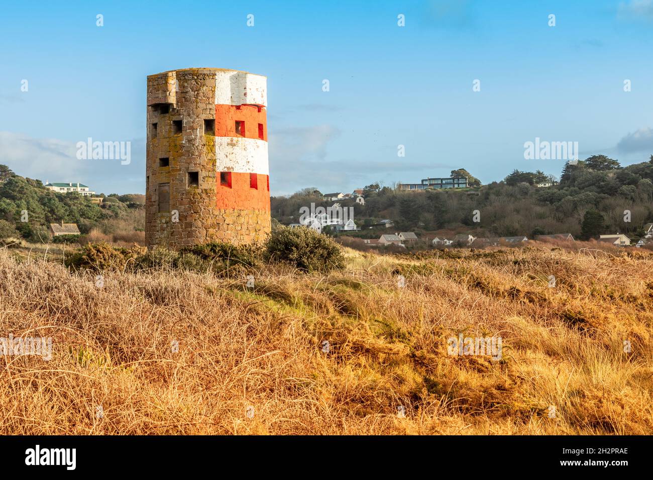 Saint Brelade British round coastal defence tower standing in the field, bailiwick of Jersey, Channel Islands Stock Photo