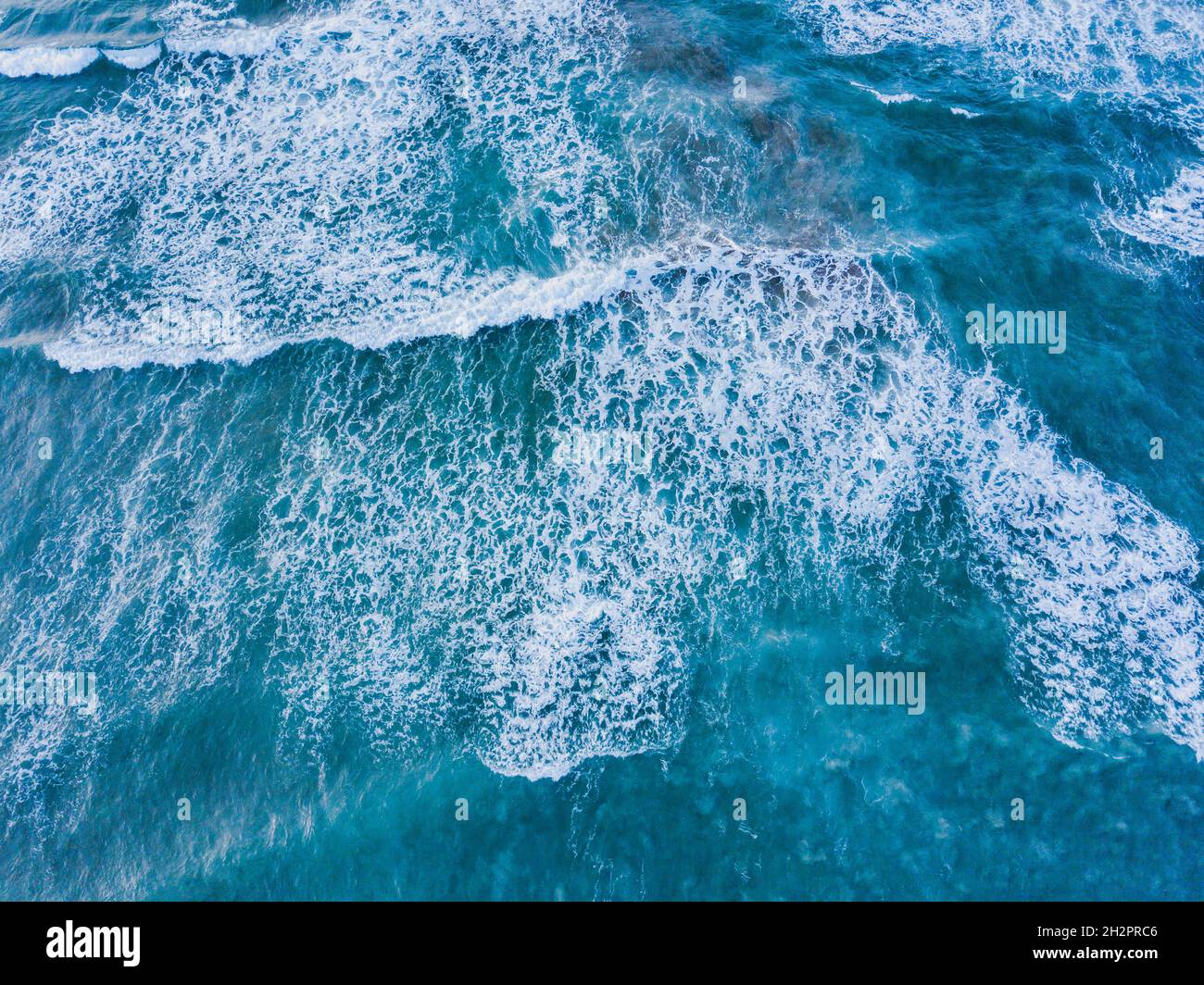 beautiful blue ocean wave from above, water surface texture background aerial view from drone Stock Photo