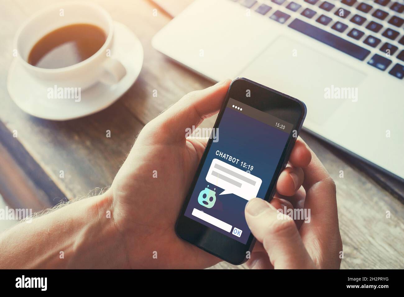 chatbot on website answering questions online, robot assistant help concept Stock Photo