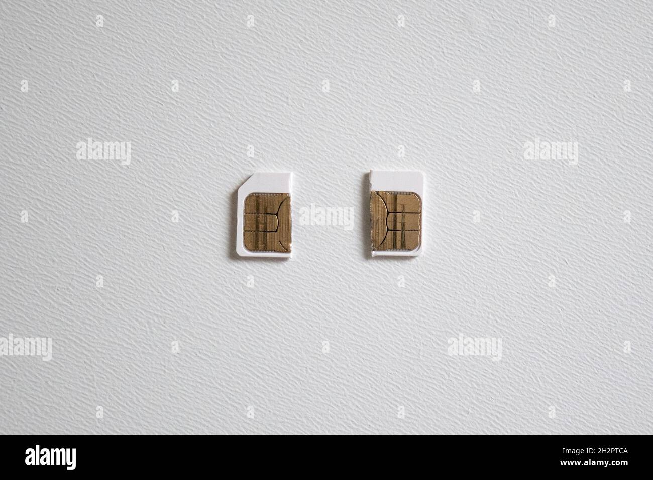 A sim card cut in half Stock Photo Alamy