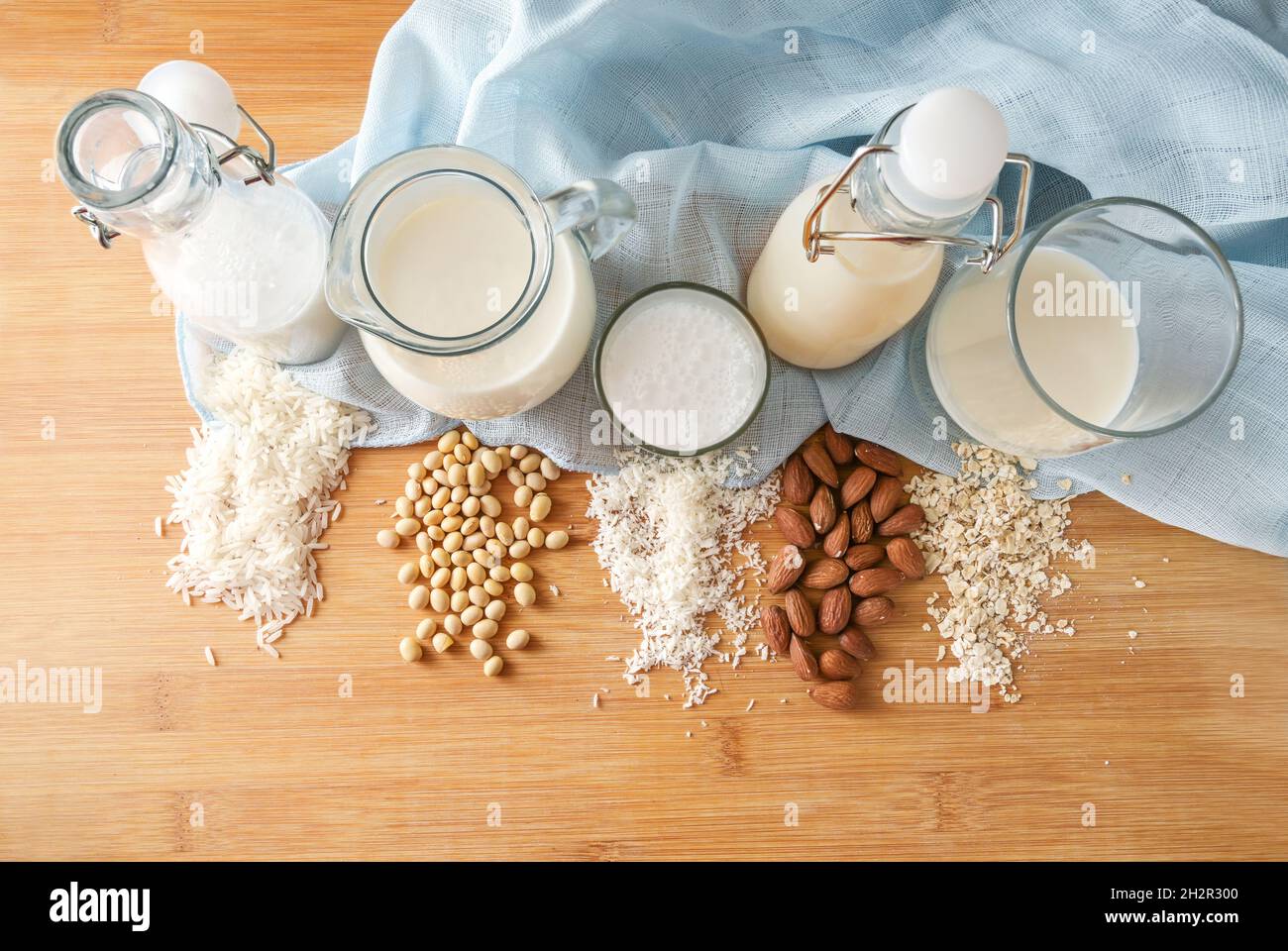 Vegan milk in various alternatives from rice, soy, coconut, almond and