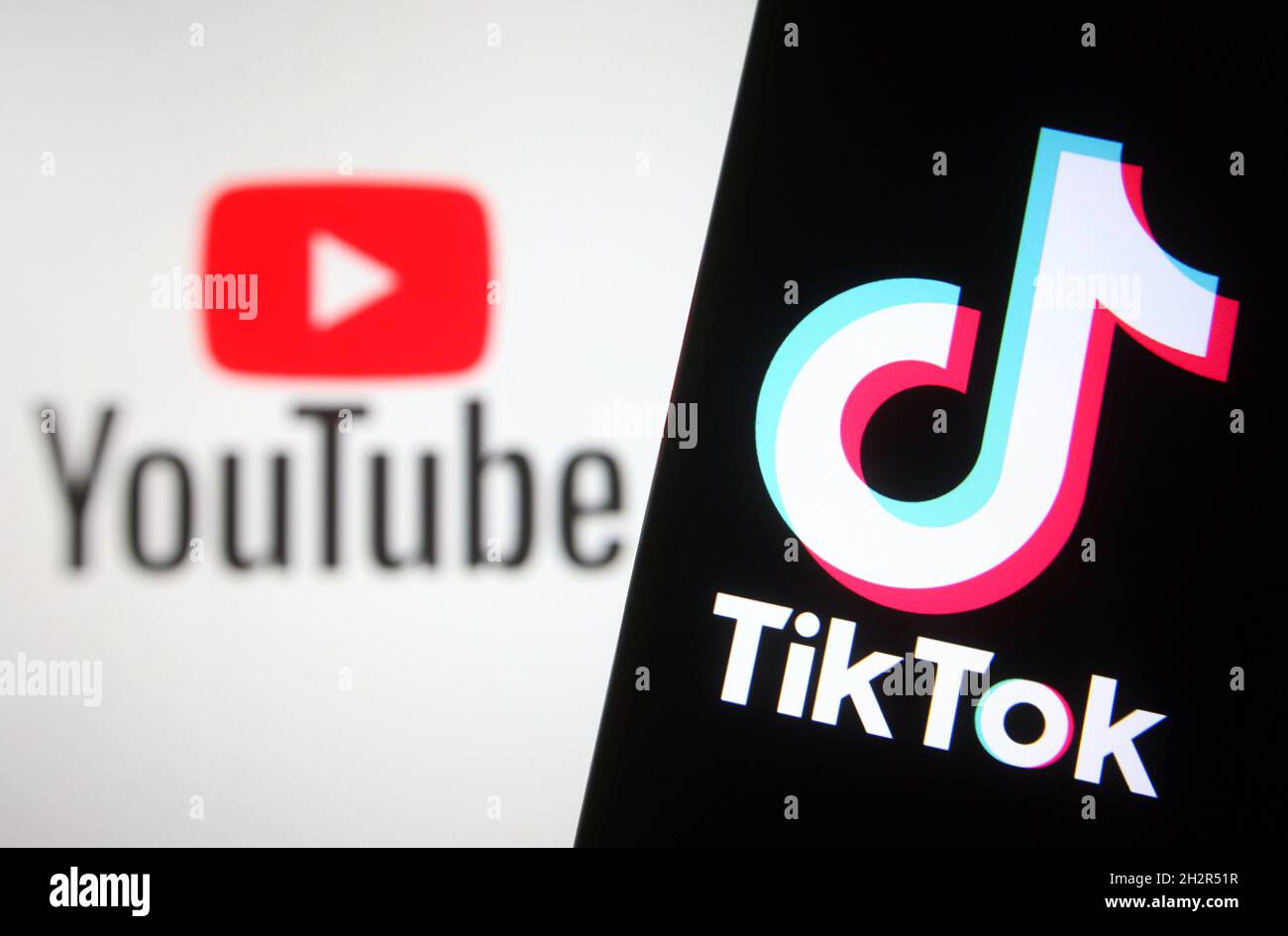 Ukraine. 23rd Oct, 2021. In this photo illustration a TikTok logo is seen  on a smartphone screen with a YouTube logo of an online video sharing and  social media platform in the