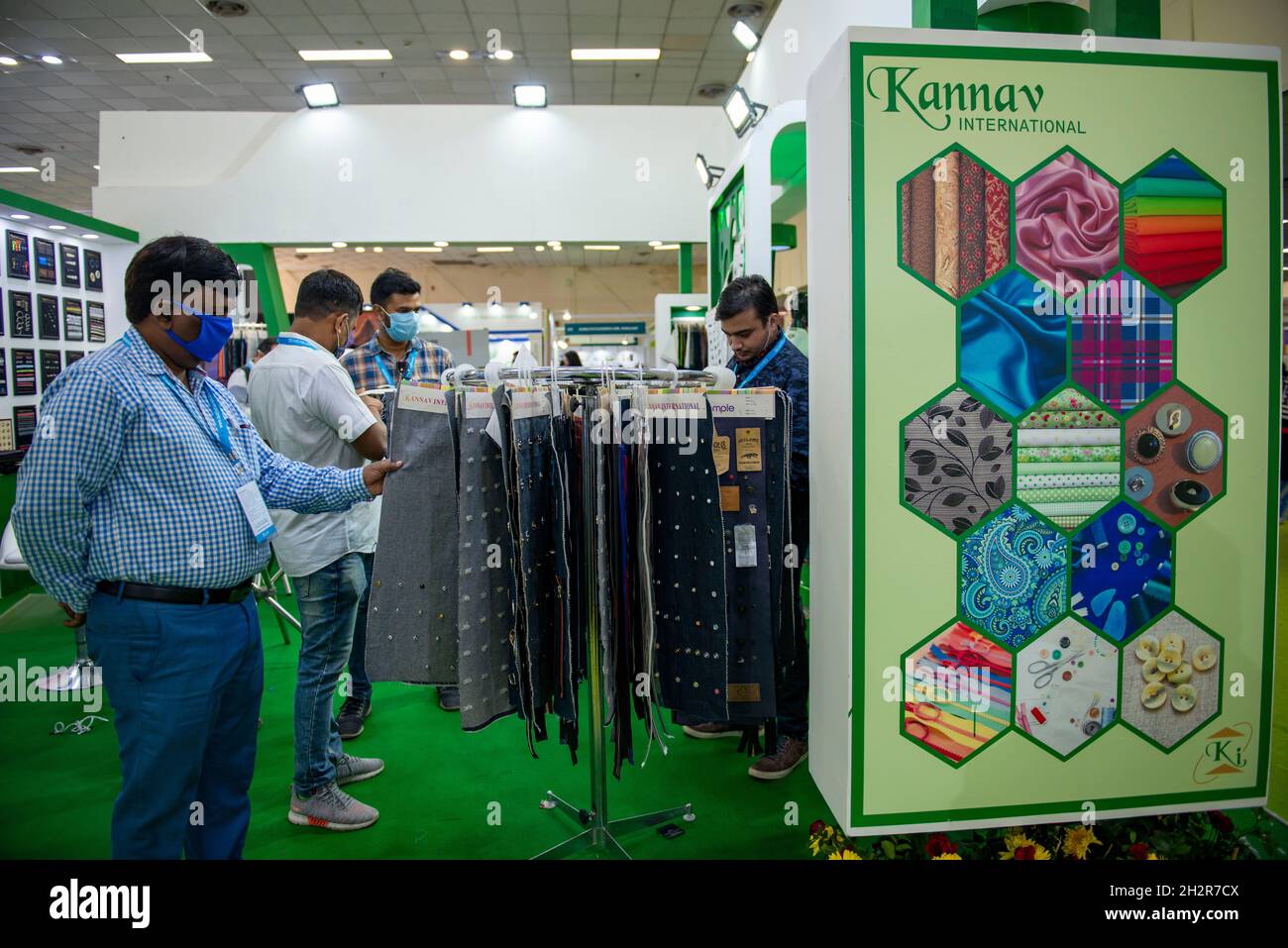 New Delhi, India. 23rd Oct, 2021. Buyers seen at a fabric stall during