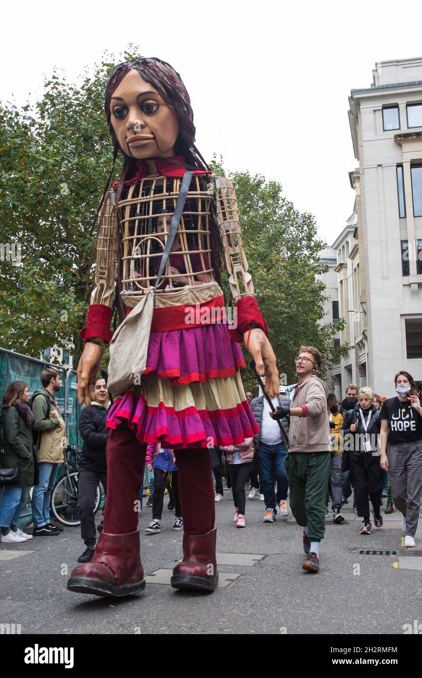 London, UK. 23rd October, 2021. Little Amal, a giant puppet of a Syrian