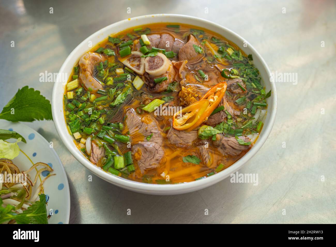 Delicious traditional Vietnamese noodles Bun Bo Hue Stock Photo