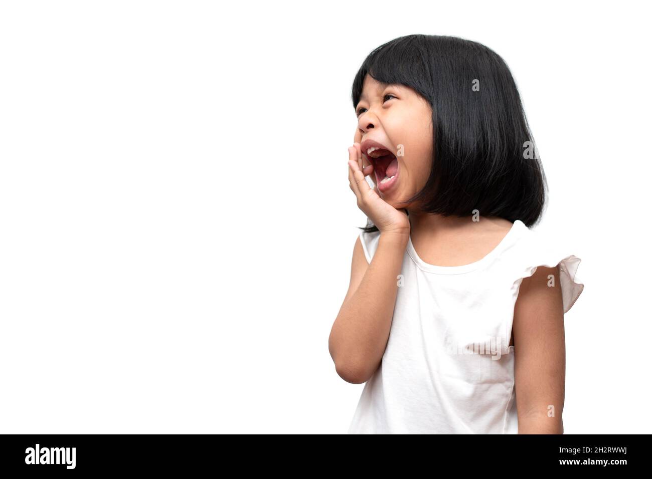 Portrait of angry emotional Asian girl screaming and frustrated shouting with anger, crazy and yelling on white background, Concept of attention defic Stock Photo