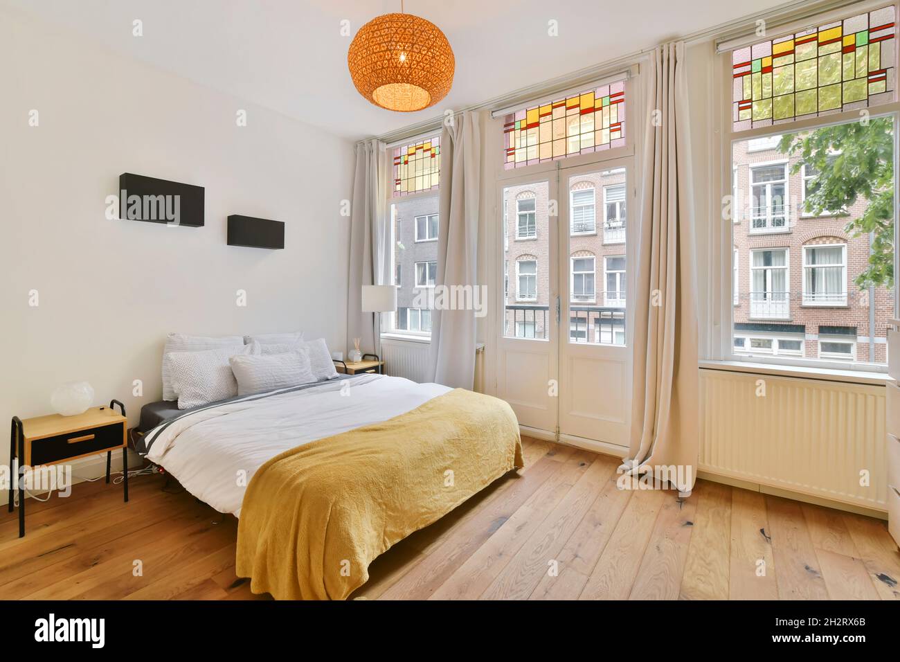 Beautiful interior design of modern and cozy bedroom Stock Photo - Alamy