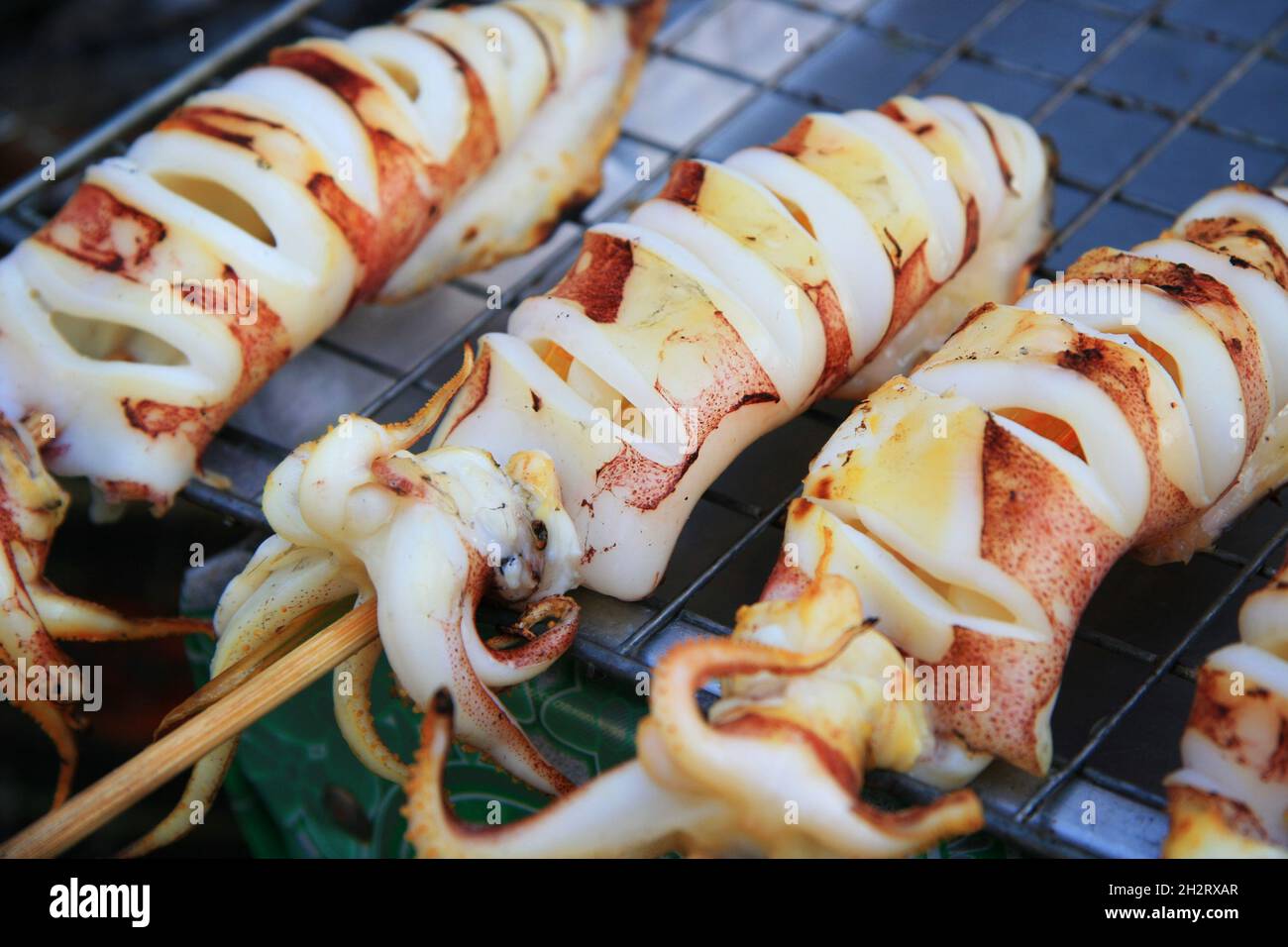 Stuffed squid barbeque hi-res stock photography and images - Alamy