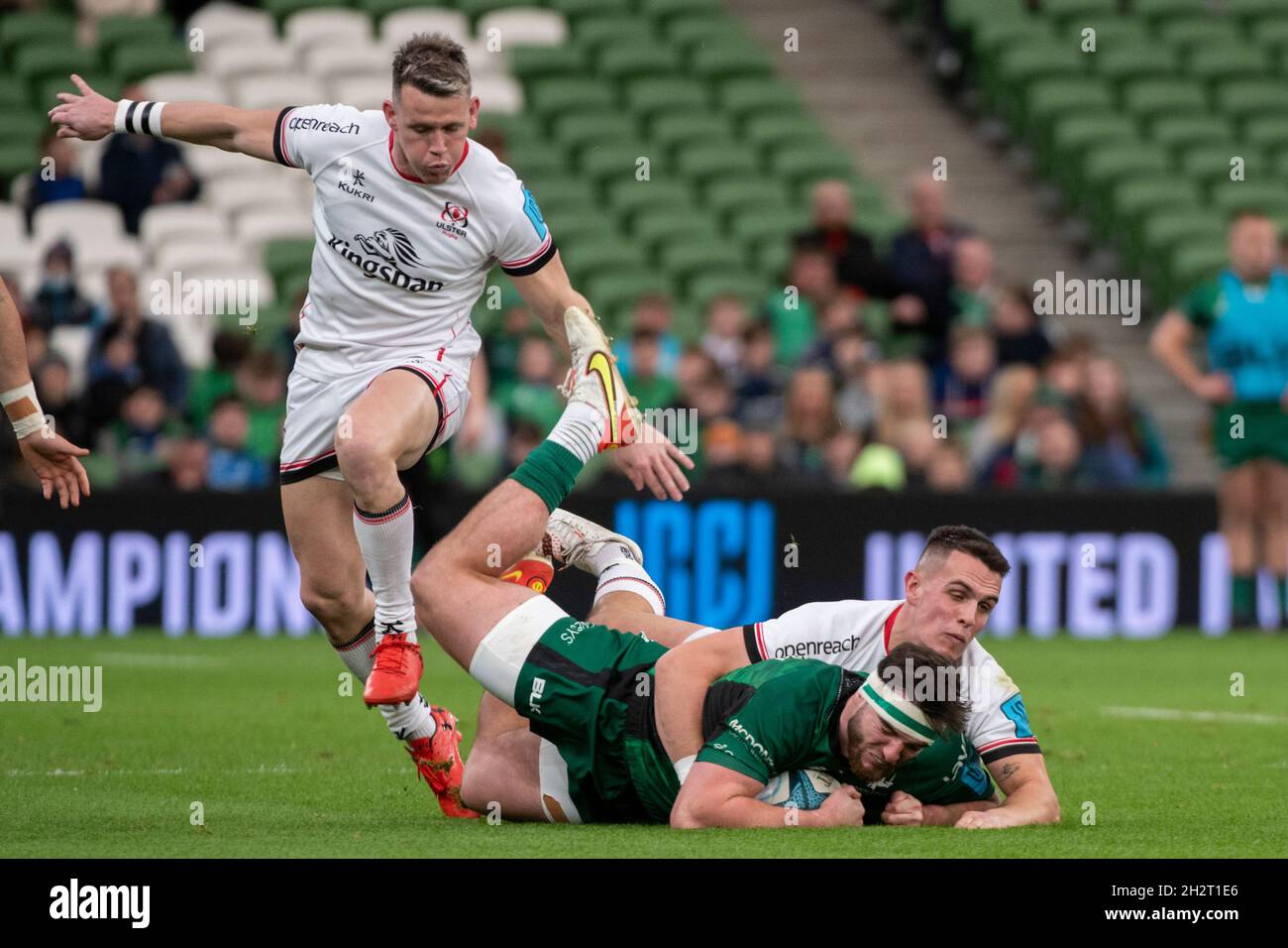 Tom DALY of Connacht tackled by James HUME of Ulster during the United Rugby Championship Round 5 match between Connacht Rugby and Ulster Rugby at Aviva Stadium in Dublin, Ireland on October
