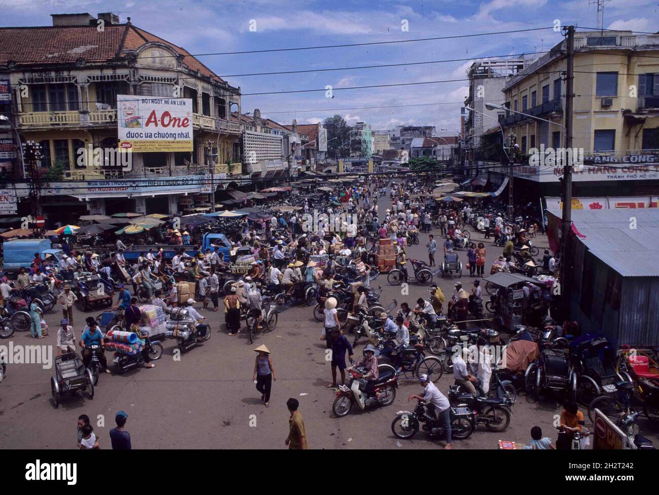Street scene in 1994 before cars popular, Cholon market area, Ho Chi Minh City, Vietnam Stock Photo