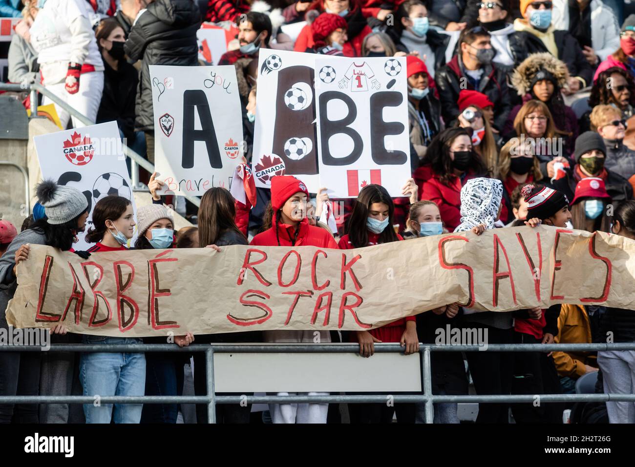 Ottawa, Canada, October 23, 2021: Team Canada fans with signs supporting their team during the Celebration Tour match between Canada and New Zealand at TD Place in Ottawa, Canada. Canada won the match 5-1. Stock Photo