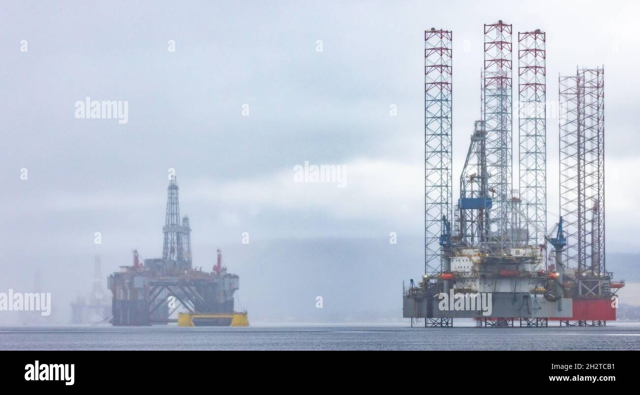 Oil rigs in the mist, stored in the Cromarty Firth, Scotland from Cromarty Stock Photo