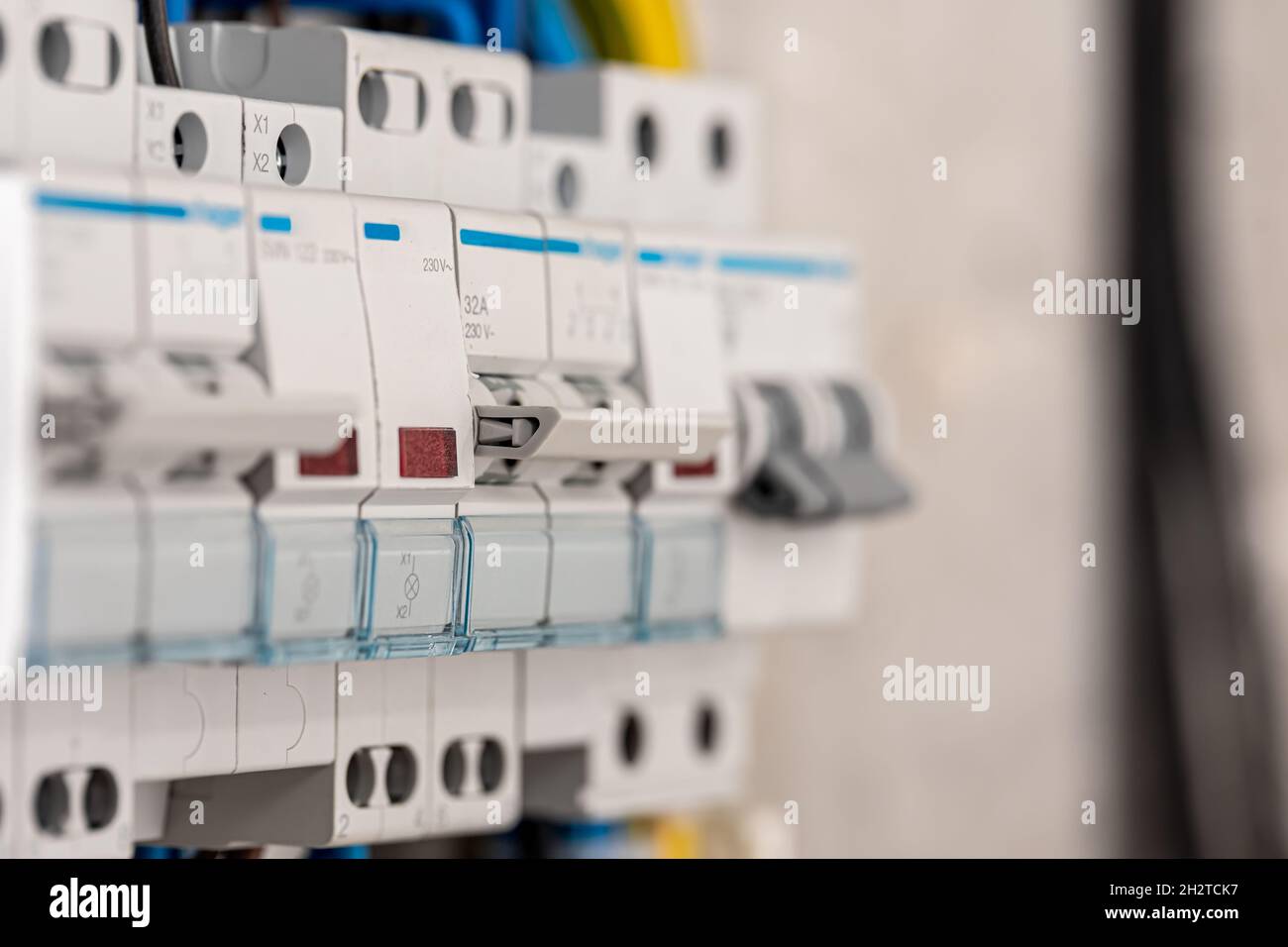Voltage switchboard with circuit breakers, close up. Stock Photo