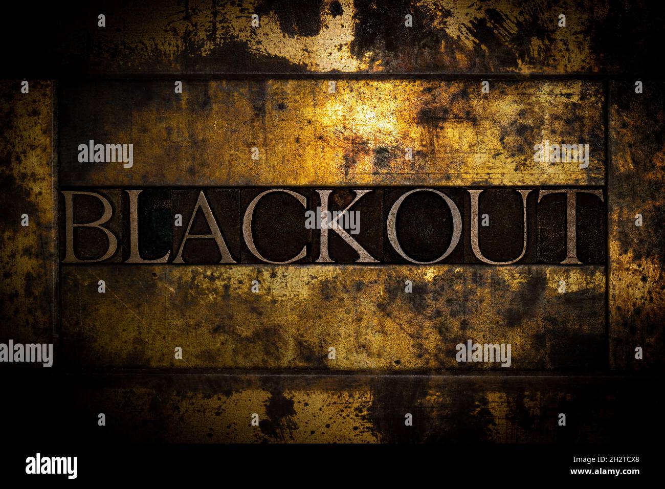 Blackout text on textured grunge copper and vintage gold background Stock Photo
