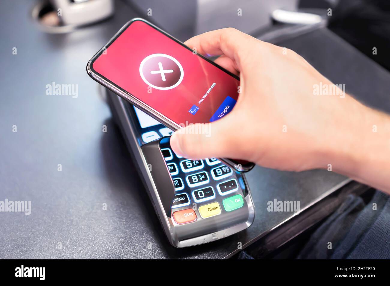 Payment error while paying with phone. Problem with mobile wallet. Digital transaction fail. Cancel purchase. Contactless nfc technology failure. Stock Photo