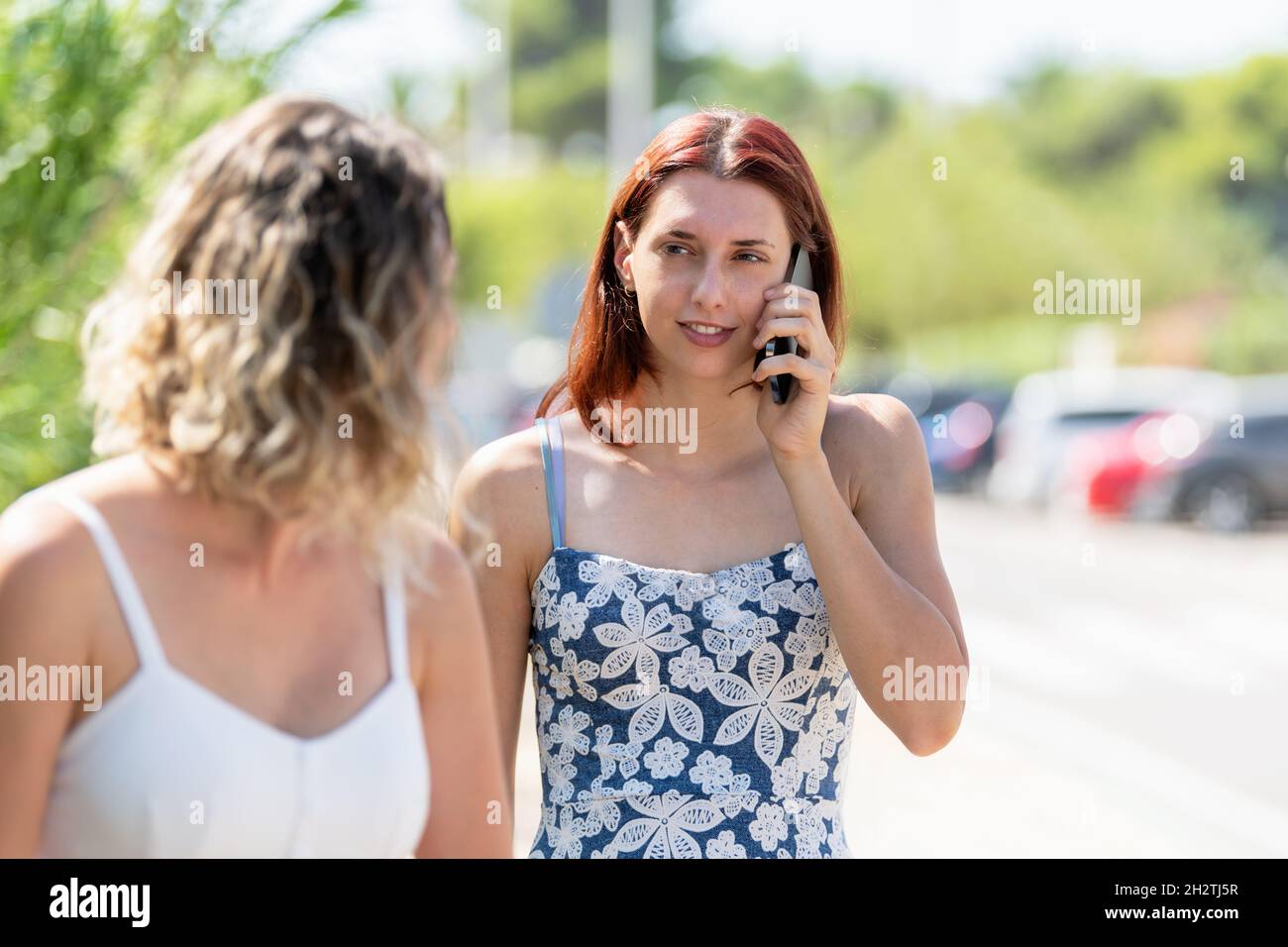 Women walking street real hi-res stock photography and images - Alamy