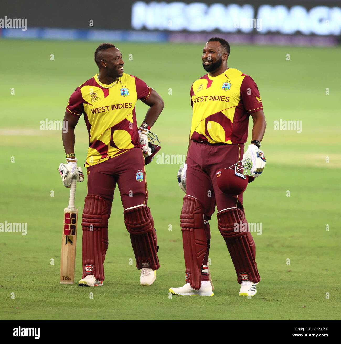 Dubai, October 23, 2021 - West Indian Batsmen Russel and Pollard in jubilant mood during the ICC T20 World cup in Dubai on Saturday Photo Seshadri SUKUMAR Credit Seshadri SUKUMAR/Alamy Live News