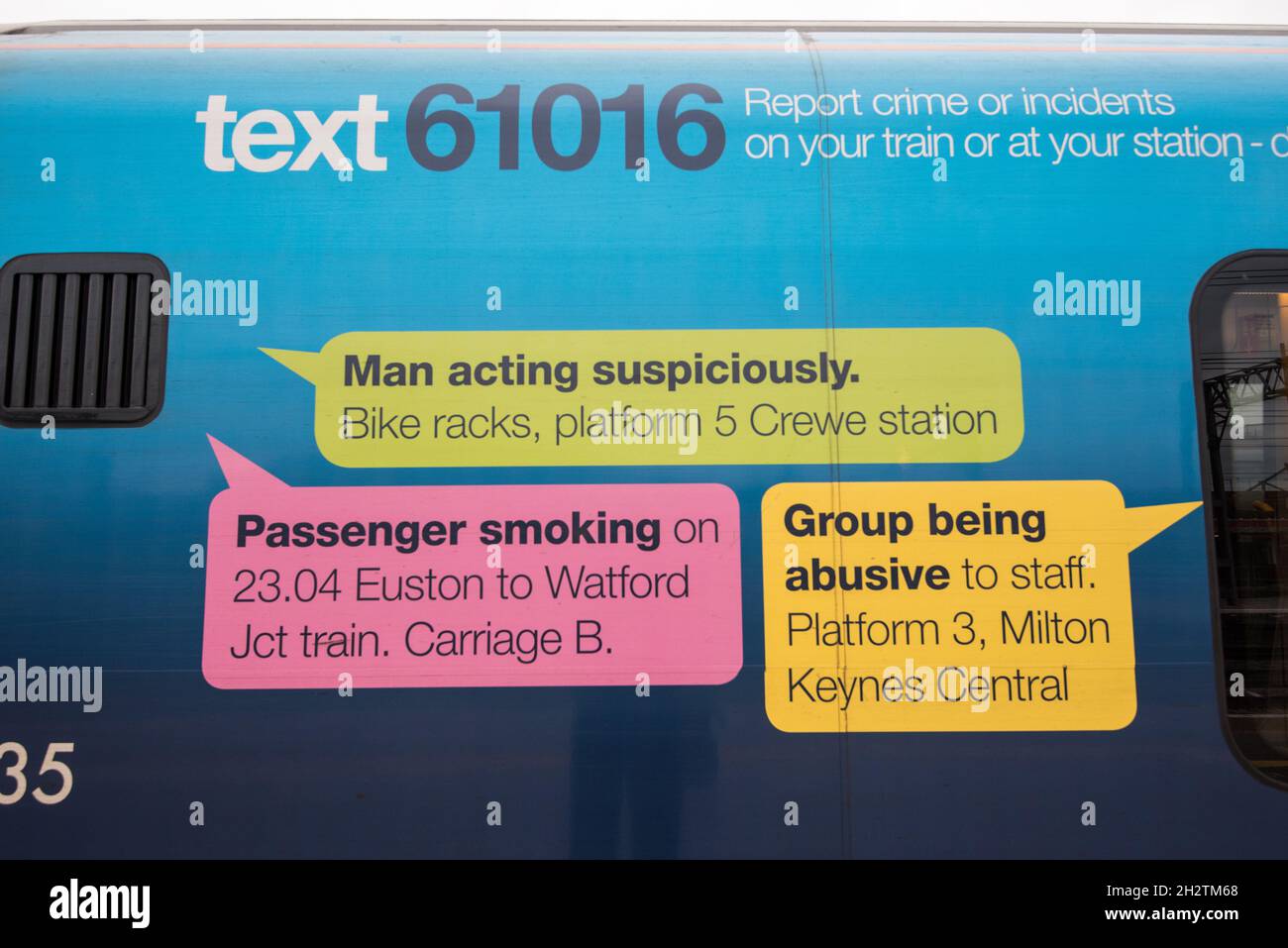 Text  relating to reporting railway crime .......on a train carriage (parked at Crewe railway station),23/10/21 Stock Photo