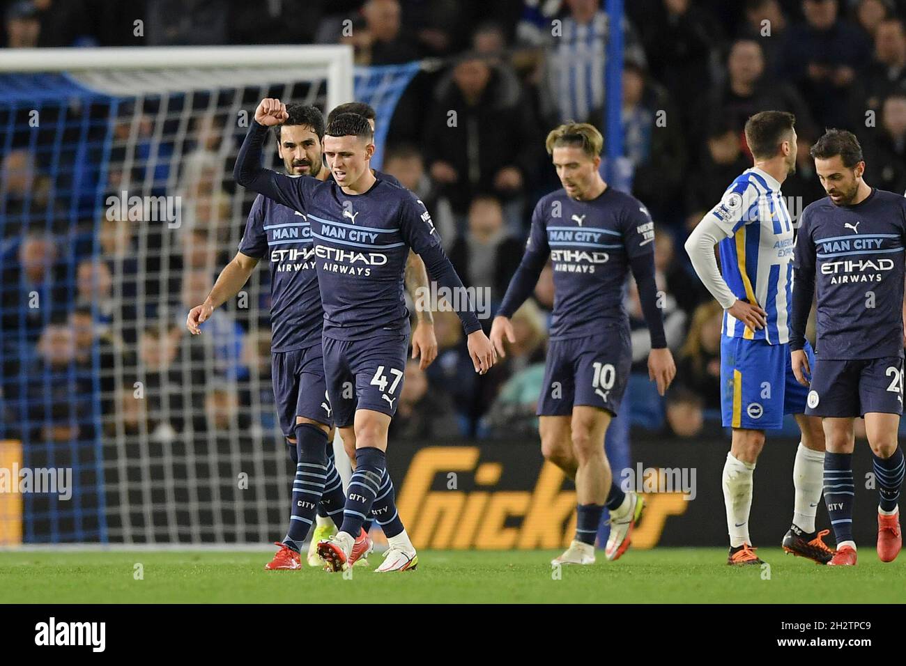 BRIGHTON, ENGLAND - OCTOBER 23: Phil Foden of Manchester City celebrates scoring his sides second goal during the Premier League match between Brighton & Hove Albion and Manchester City at American Express Community Stadium on October 23, 2021 in Brighton, England. MB Media Stock Photo