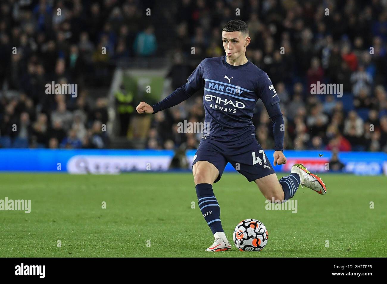 BRIGHTON, ENGLAND - OCTOBER 23: Phil Foden of Manchester City in action during the Premier League match between Brighton & Hove Albion and Manchester City at American Express Community Stadium on October 23, 2021 in Brighton, England. MB Media Stock Photo