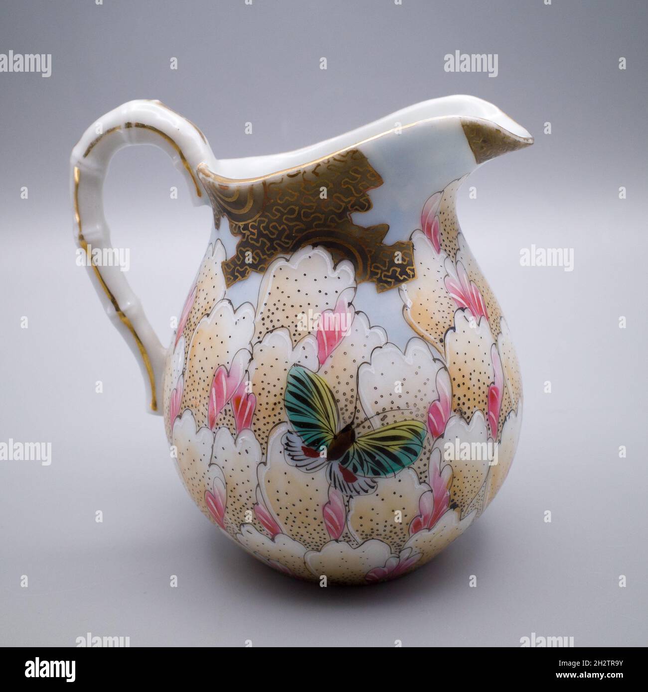 Antique Japanese Kutani Porcelain Creamer. Flower and Butterflies