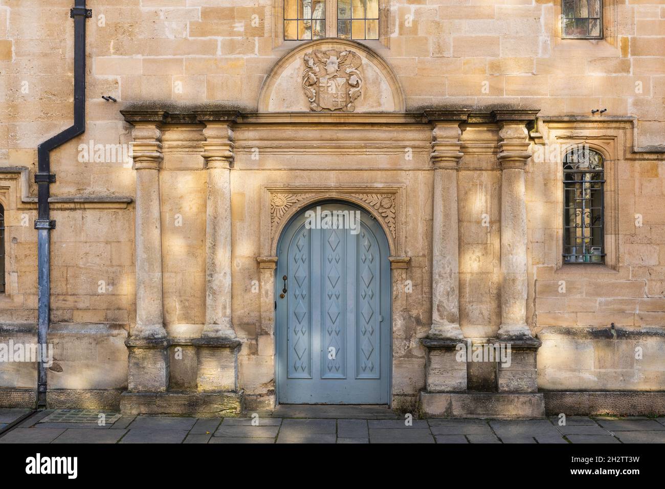 Ornate classical doorway on Merton College building Merton Street Oxford Oxfordshire England UK Stock Photo