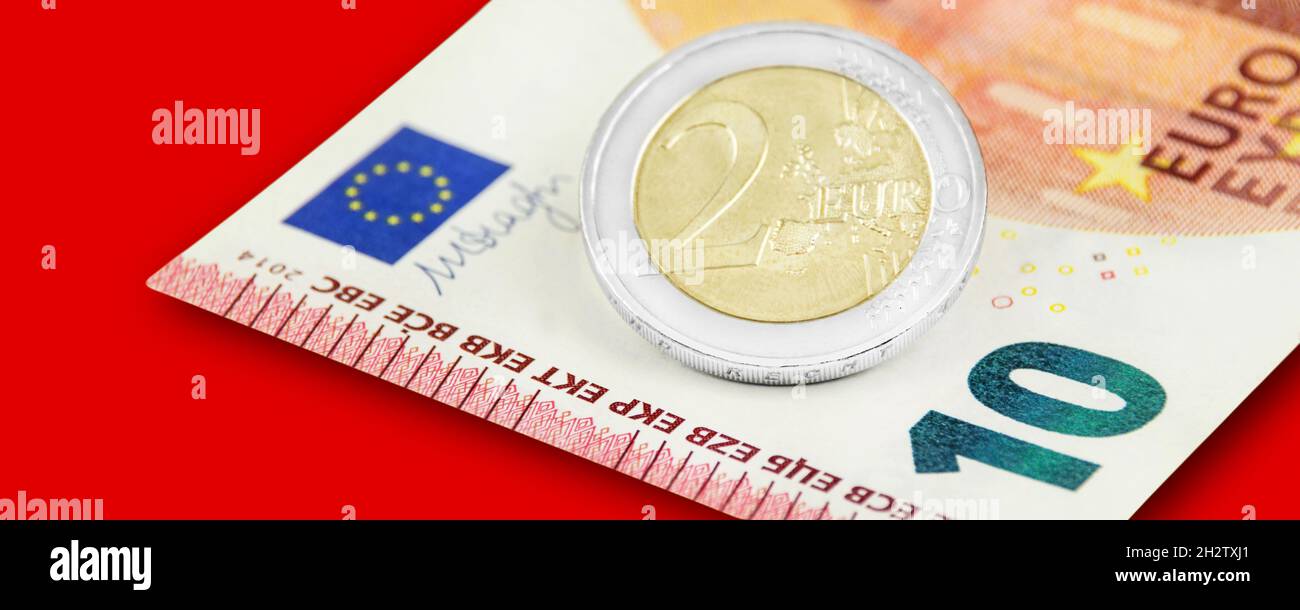 Minimum Wage 12,00 Euro on red background Stock Photo