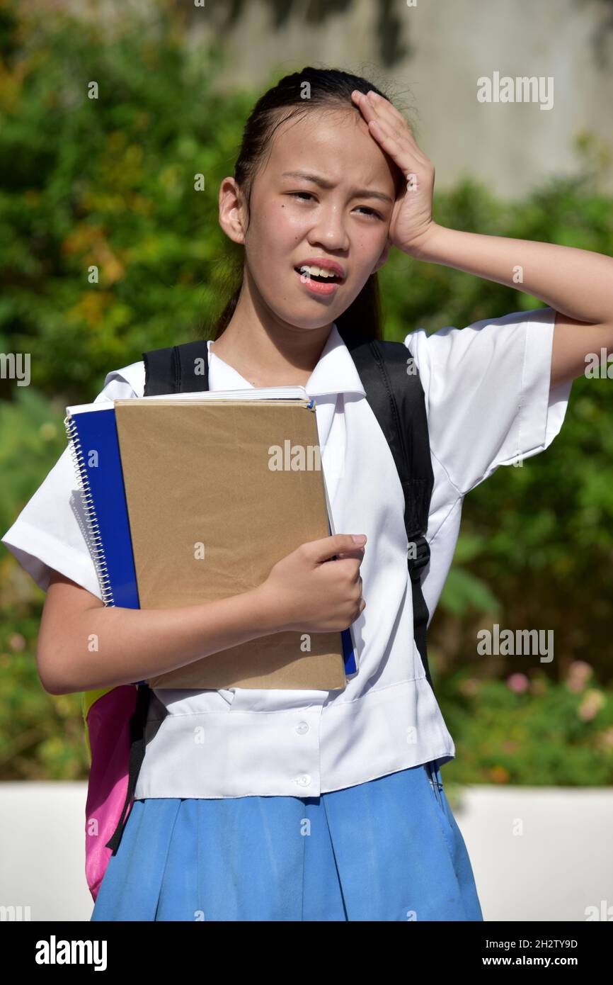 School Girl And Confusion Wearing School Uniform Stock Photo Alamy