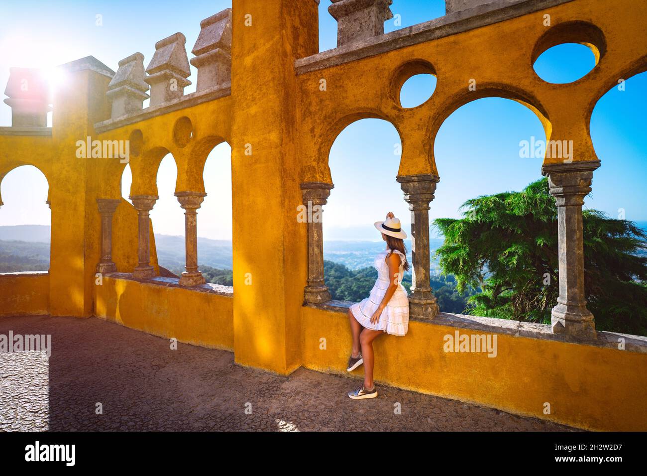 Tourist woman enjoying sunset in Sintra. Portugal. Summer holiday vacation Stock Photo