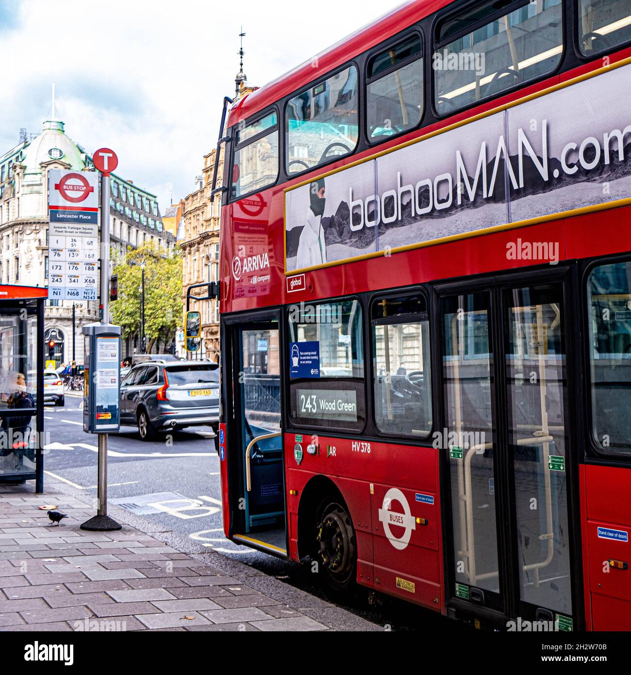 A Red Transport For London double Decker Bus Parked At A Bus Stop In Central London With No People Stock Photo