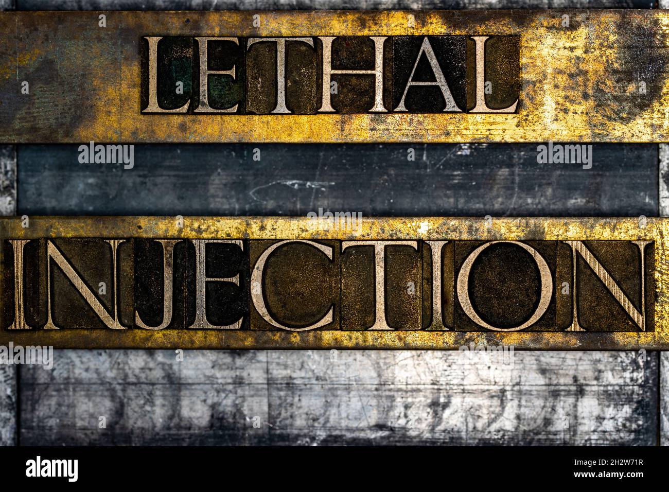 Lethal Injection text on textured grunge copper and vintage gold background Stock Photo