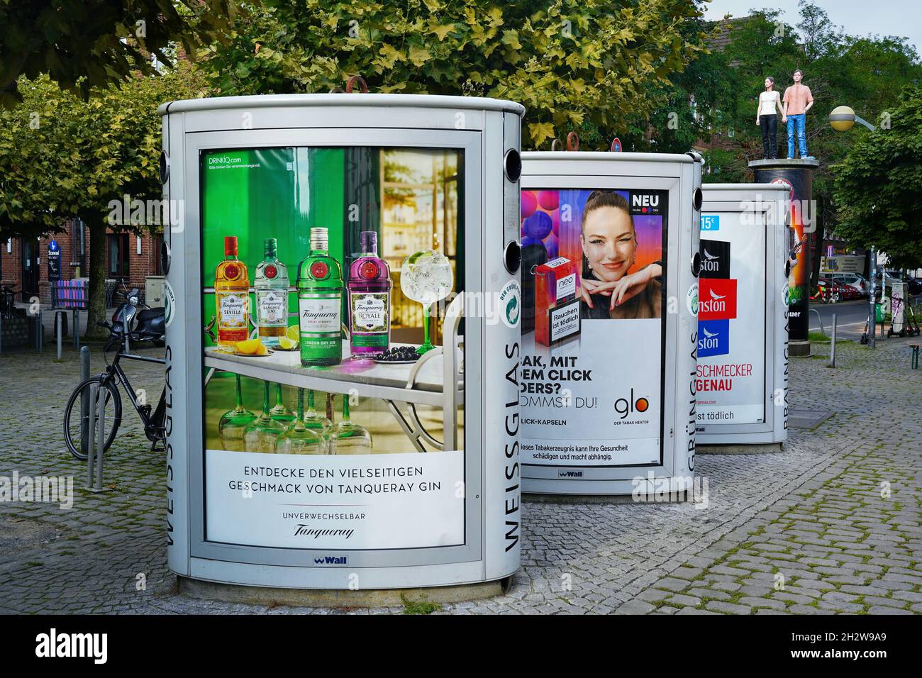 Modern and colourful waste glass/bottle containers in the Old Town of Düsseldorf/Germany. Stock Photo