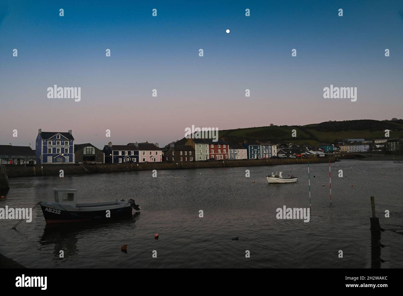 The inner harbor of aberaeron on a bright October morning at hiy  tide  West Wales UK Stock Photo